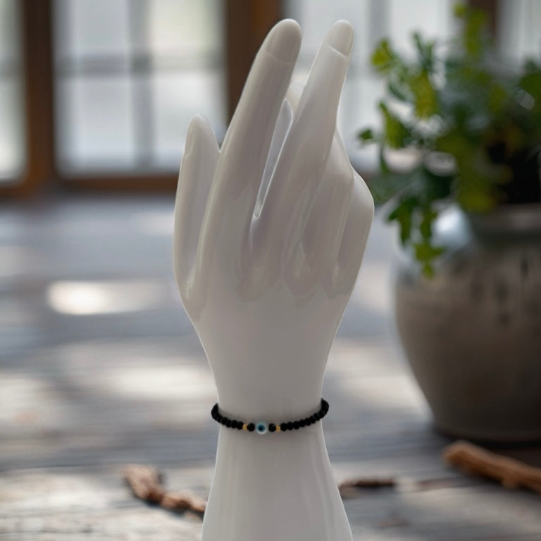 Black Onyx Bracelet with Eye and 18K Gold Stones