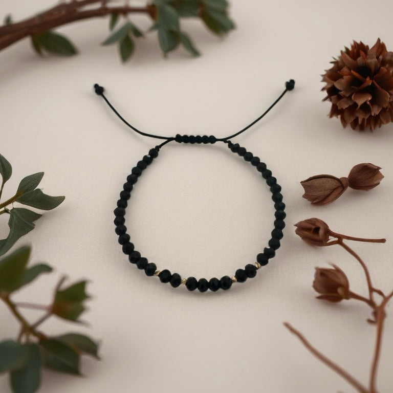 Black Onyx Bracelet with 18K Gold stones