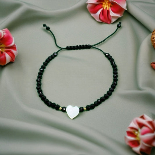 Black Onyx Bracelet with 18K Gold Stones and White Heart